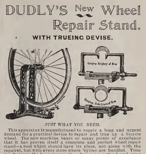 Dudly's Wheel Repair Stand Advertisement.