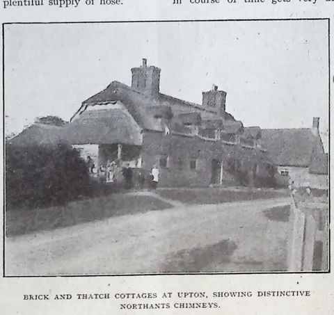 Brick and thatch cottages at Upton, showing distinctive Northants chimneys