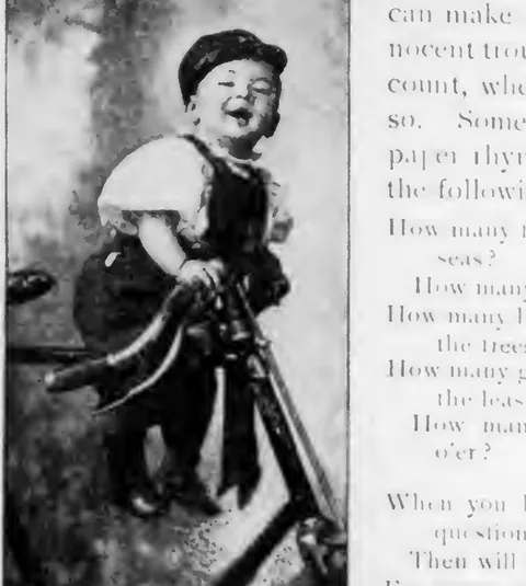 Photographing the Baby (boy in costume)