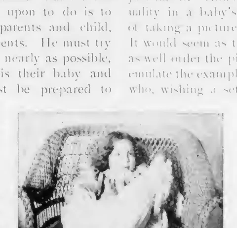 Photographing the Baby (infant in wicker chair)